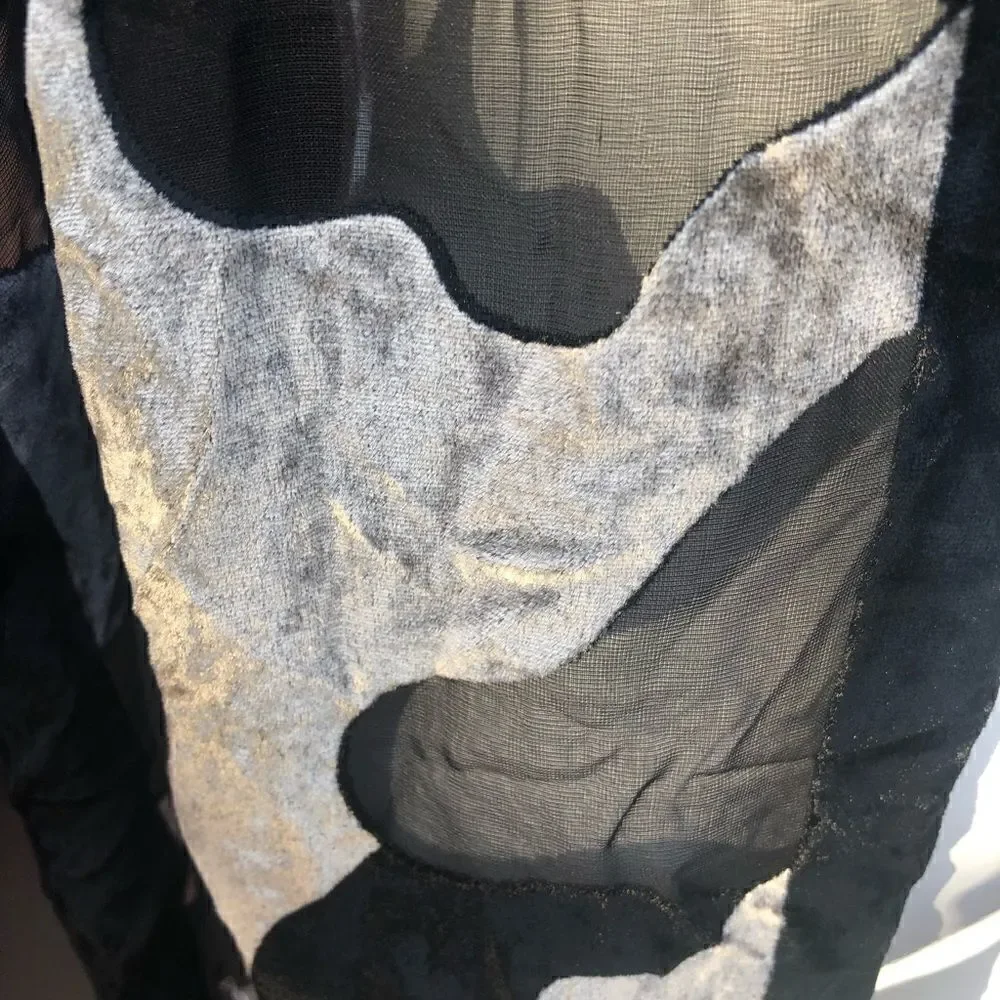 Authentic cocoon house scarf.